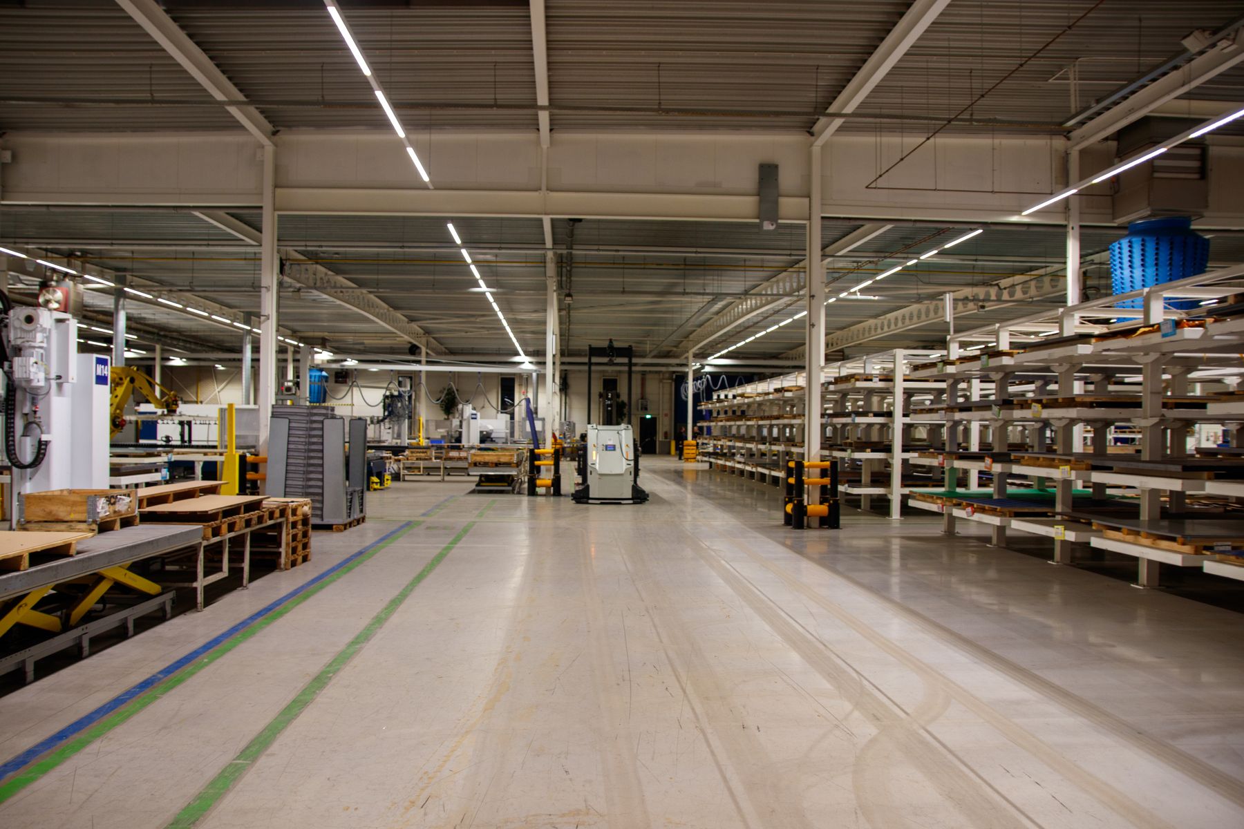 Modern operations floor with industrial equipment and organised work zones